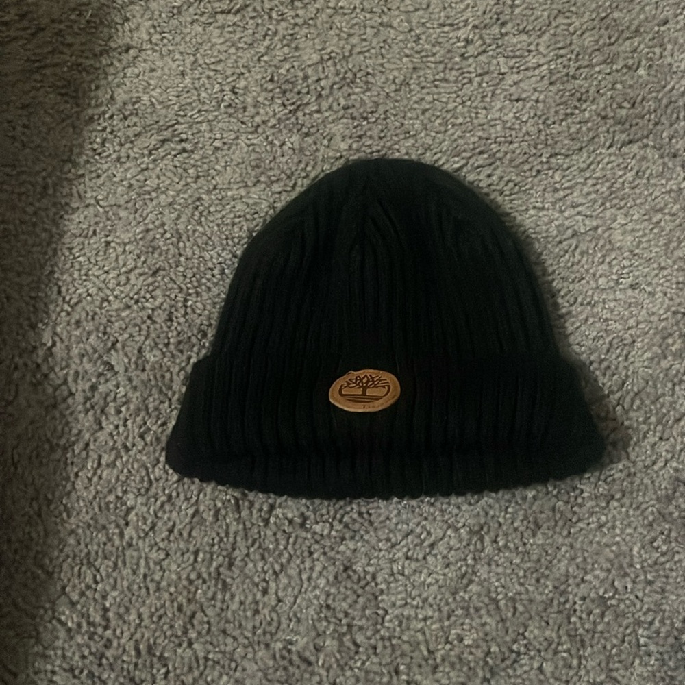 Medium, cotton and leather hat.